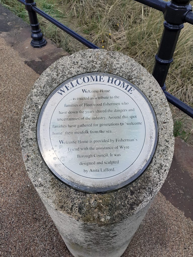 Stone depicting details of the Welcome Home statue Fleetwood