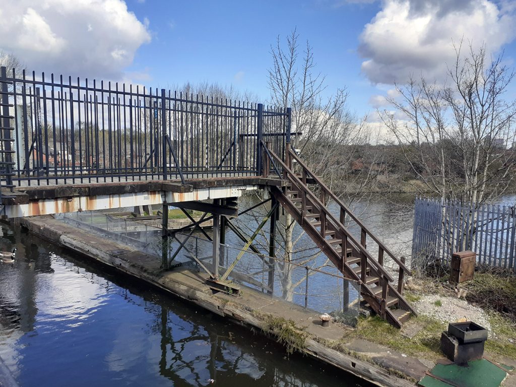 There are steps available to see the water in the swing bridge