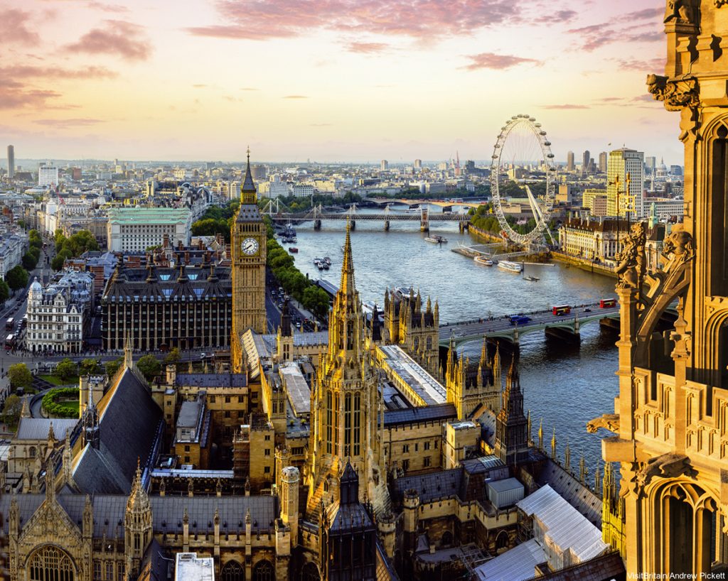 View from Victoria Tower of the Houses of Parliament, the River Thames, Westminster and Westminster Bridge, with the London Eye in the distance, London, England.