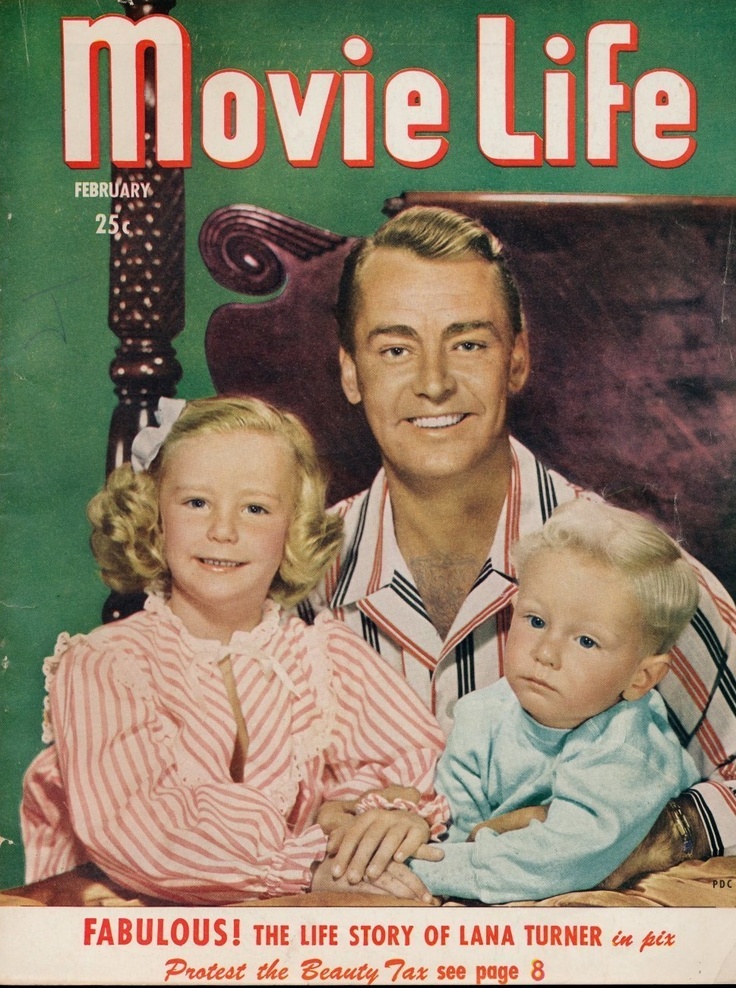 Magazine cover of actor Alan Ladd with his new family