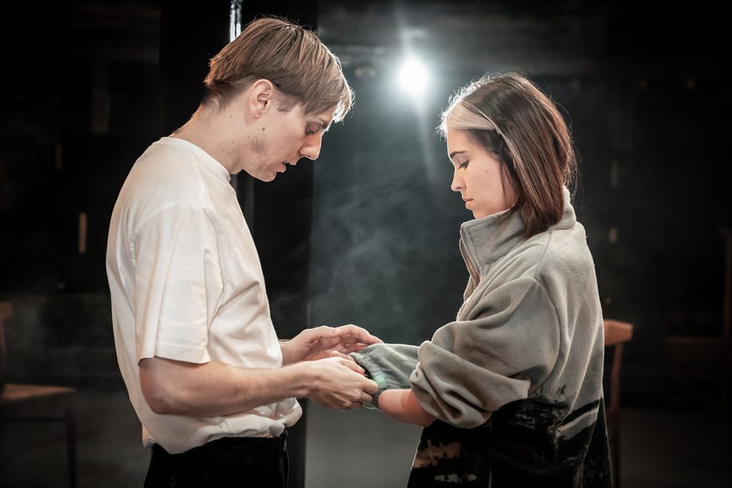 Joshua James (Tom) & Rhiannon Clements (Laura) in The Glass Menagerie at The Royal Exchange - Image Marc Brenner