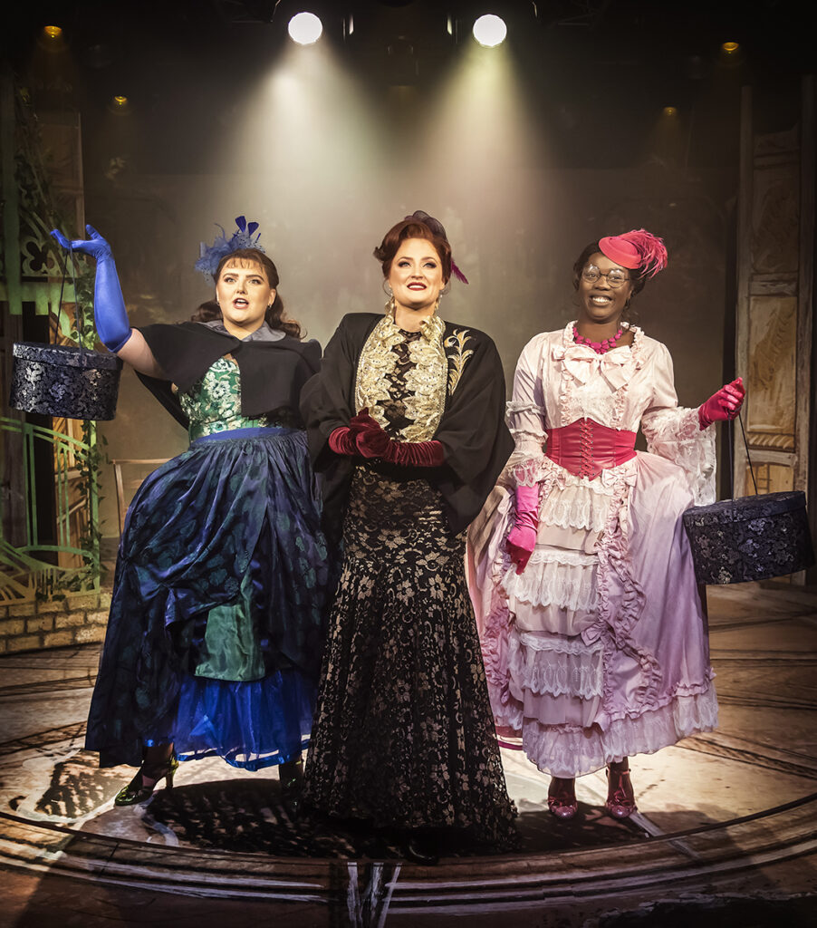Katie Ramshaw as Charlotte, Annie Aitken as Madame and Olivia Faith Kamau _ Cinderella at Hope Mill Theatre. Image Pamela Raith Photography