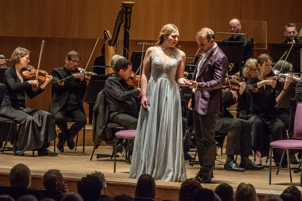 Sophia Theodorides as Leïla and Nico Darmanin as Nadir with the Orchestra of Opera North. Photo credit: Charlotte Wellings