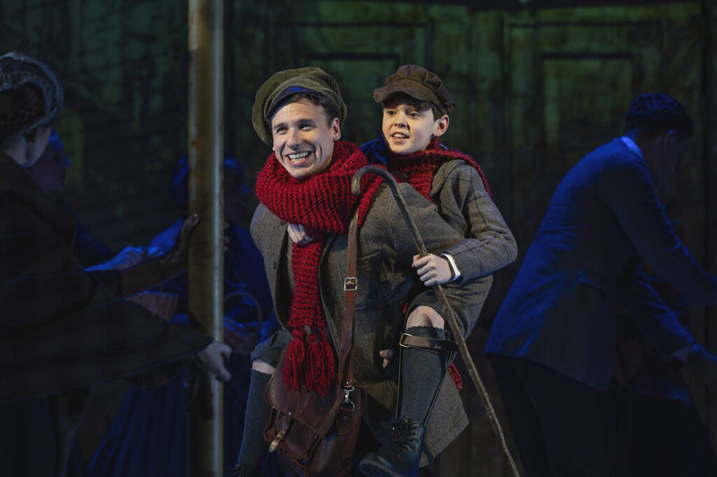 Matt Jeans as Mr Cratchit and Joel Tennant as Tiny Tim. Photo by Matt Crockett