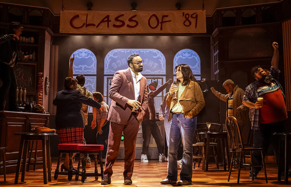 Shakil Hussain as Frank & Nina Wadia as Gemma in NOW That's What I Call A Musical, credit Pamela Raith