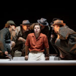 Ed McVey (centre) as Tom Ripley & the cast in THE TALENTED MR RIPLEY, credit Mark Senio