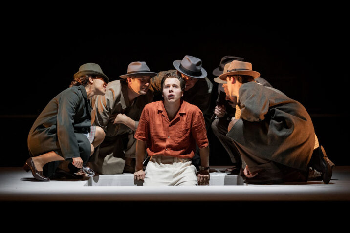 Ed McVey (centre) as Tom Ripley & the cast in THE TALENTED MR RIPLEY, credit Mark Senio