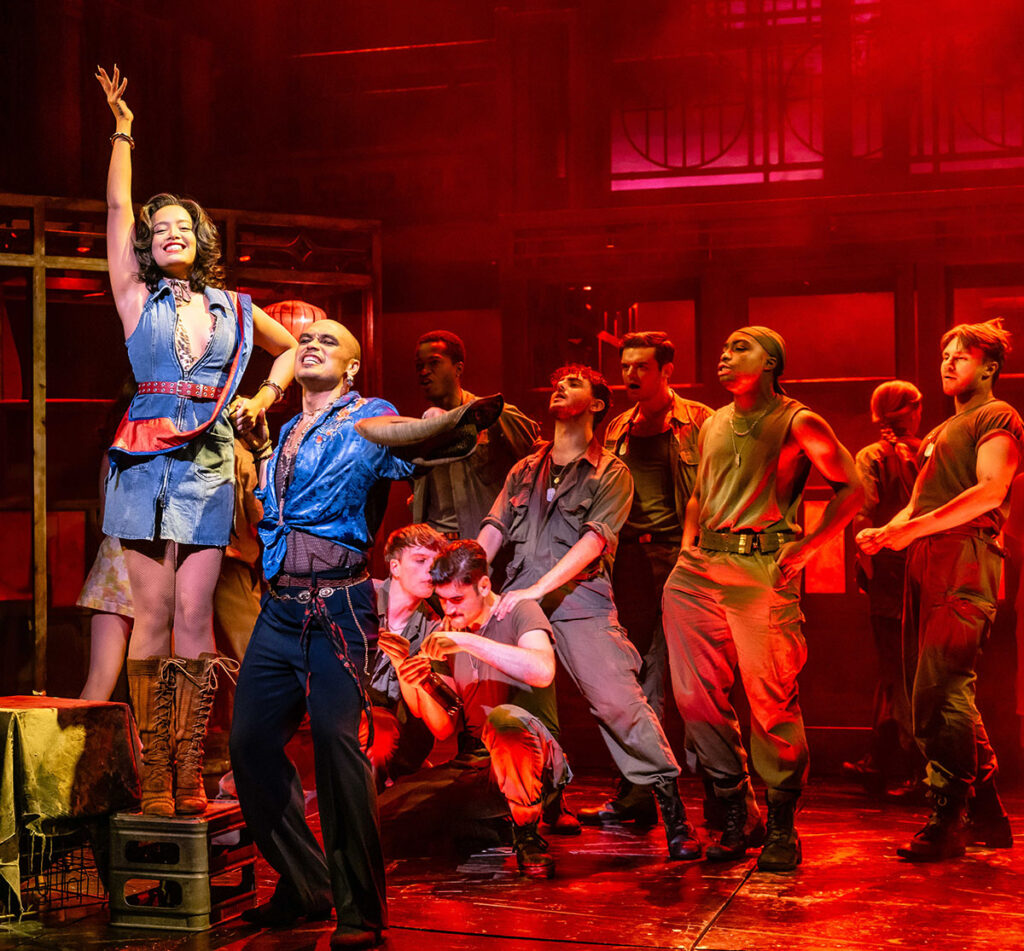 MISS SAIGON. Ace (Gigi), Seann Miley Moore (The Engineer) and Company. Photo Danny Kaan.