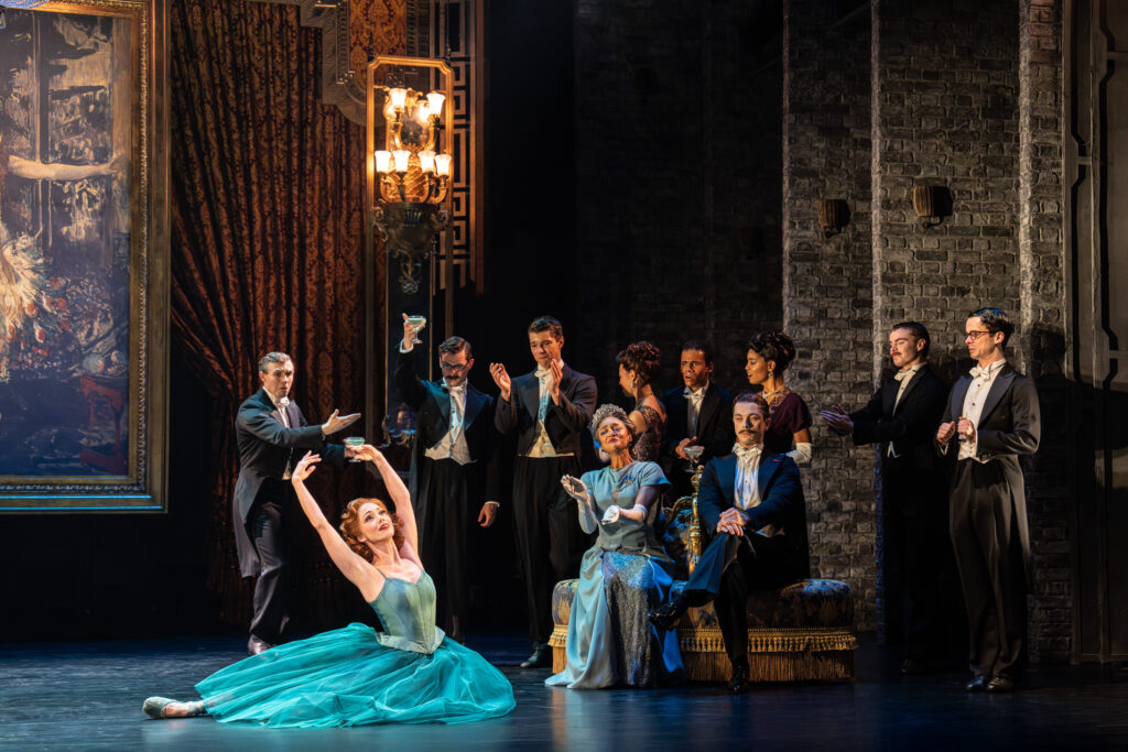 Matthew Bourne's production of THE RED SHOES. Ashley Shaw as Victoria Page and Company. Photo by Johan Persson