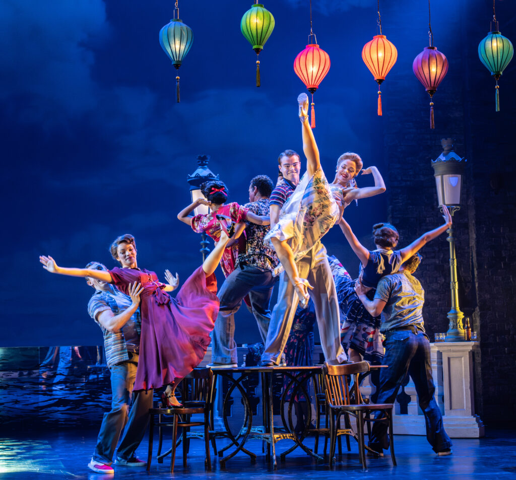 Matthew Bourne's production of THE RED Shoes. Company. Photo by Johan Persson