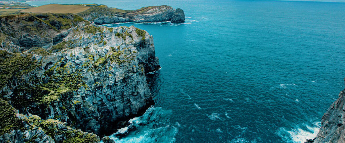 Photo by Pixabay: https://www.pexels.com/photo/green-hill-near-body-of-water-462162/