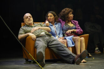 LtoR Dana Haqjoo Eddie's Dad/Mr-Bald/Tom Stanley/Brian; Lucie Shorthouse as Chantel/Claire/Linda; Shoba Gulati as Brenda/Helen/Marion in Road at the Royal Exchange Theatre Photo Ros Kavanagh