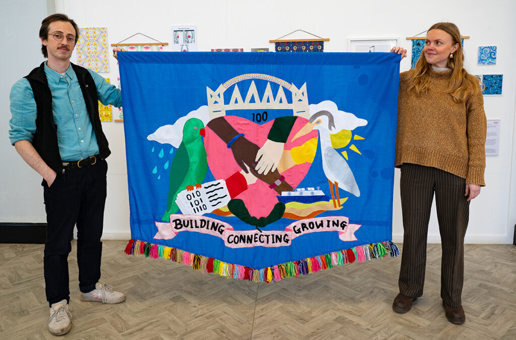 Artists Emily Simpson & Chris Alton with banners. Photo by Breige Cobane