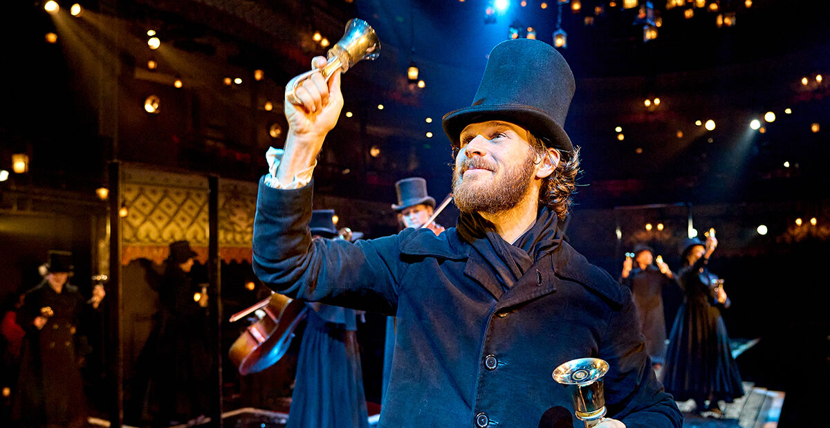 Rob Compton (Bob Cratchit) in A Christmas Carol at The Old Vic (2024). Photo by Manuel Harlan