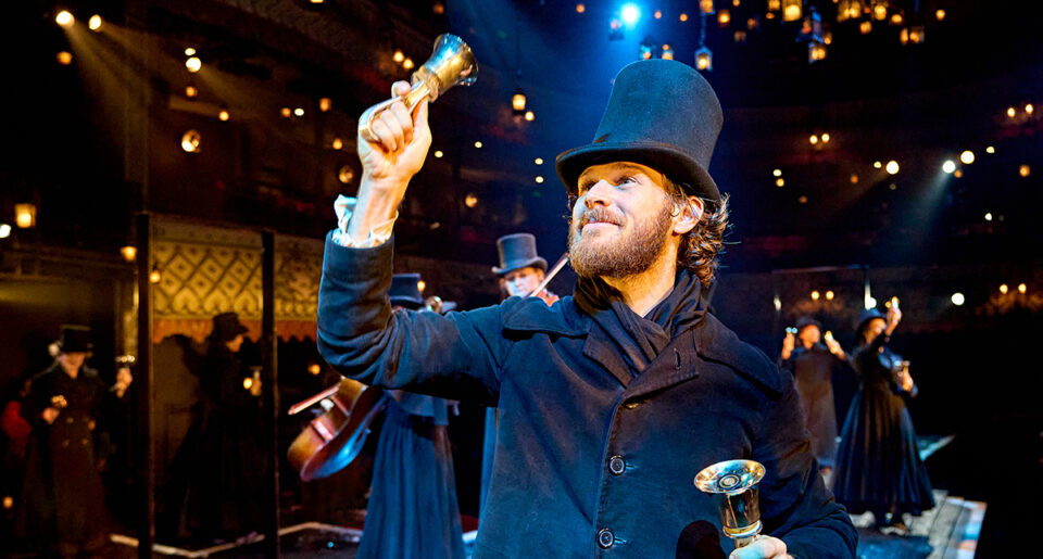 Rob Compton (Bob Cratchit) in A Christmas Carol at The Old Vic (2024). Photo by Manuel Harlan