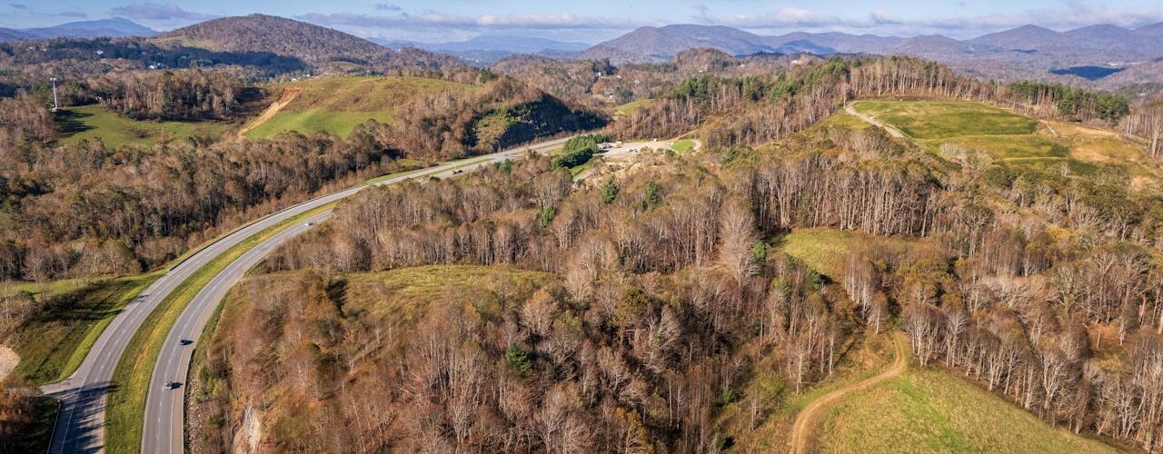 Scenic View of Appalachian Mountains and Highway Photo by Mark Stebnicki: https://www.pexels.com/photo/scenic-view-of-appalachian-mountains-and-highway-29056565/