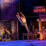 Matthew Bourne's THE CAR MAN. Harrison Dowzell (Luca) and Company. Photo by Johan Persson