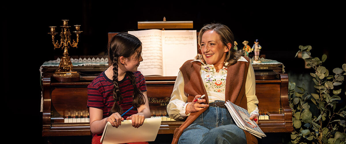 L-to-R Harriet O'Shea as Small Alison and Alex Young as Helen Bechdel in Fun Home at the Royal Exchange Theatre. Credit: Johan Persson