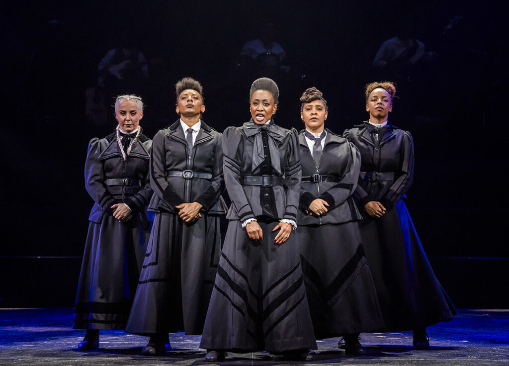 Kirstie Skivington (Adela Pankhurst), Ellena Vincent (Christabel Pankhurst), Beverley Knight MBE (Emmeline Pankhurst), Kelly Agbowu (Mrs Flora 'The General' Drummond/Betty Savoy) and Naomi Katiyo (Sylvia Pankhurst) in 2026 production of Sylvia. Photo by Tristram Kenton