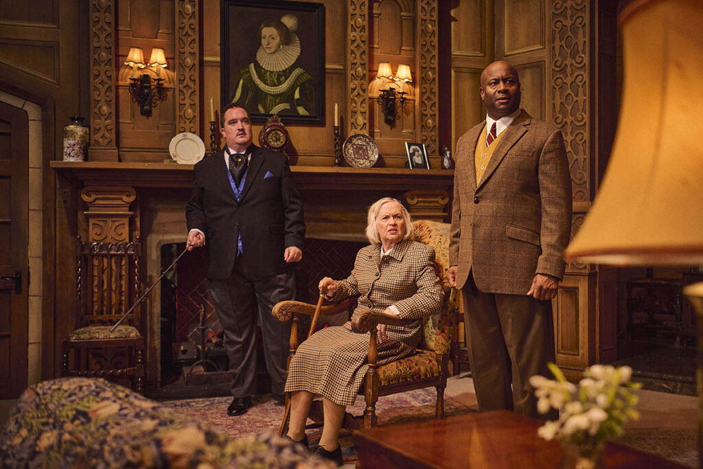L-R James Peake as Mr Paravicini , Susan Penhaligon as Mrs Boyle & Nicholas Bailey Major Metcalf for THE MOUSETRAP UK TOUR credit Matt Crockett