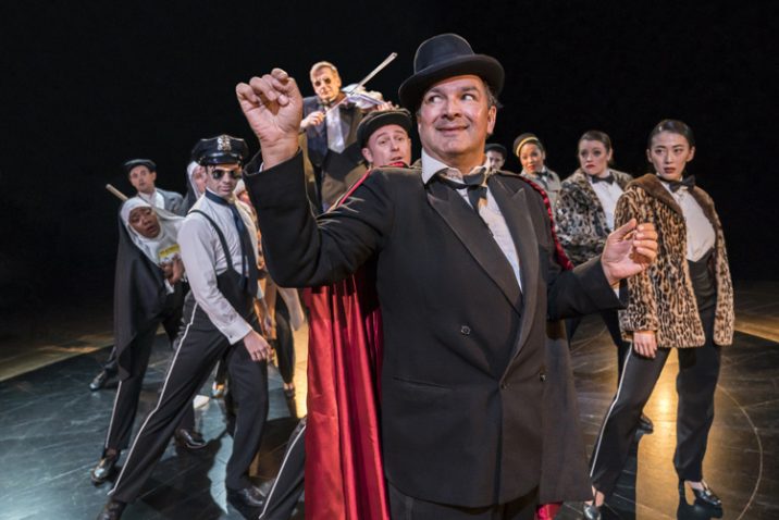 Julius DSilva as Max Bialystock and the Ensemble. Image: Johan Persson