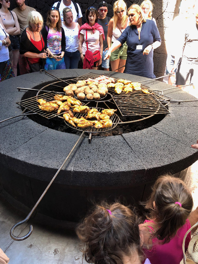 Chicken being cooked on a huge geothermal heated BBQ, Lanzarote