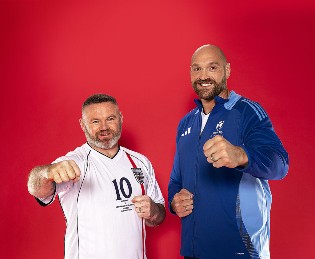Tyson Fury (right) is England Manager and Wayne Rooney is Player-Manager (left) for UNICEF 2025, which takes place on Sunday 15th of June at Old Trafford, Manchester. Photographed by Daniel Hambury for UNICEF UK and Soccer Aid Productions. ©UNICEF/Soccer Aid Productions/Stella Pictures