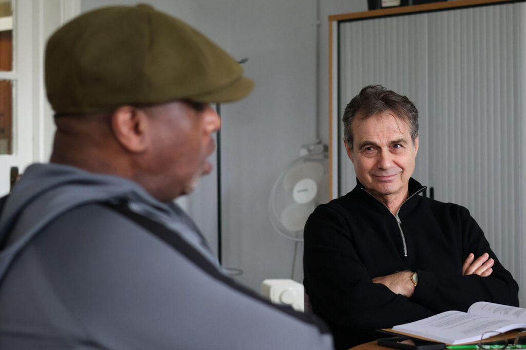 Paul Herzberg watches rehearsals