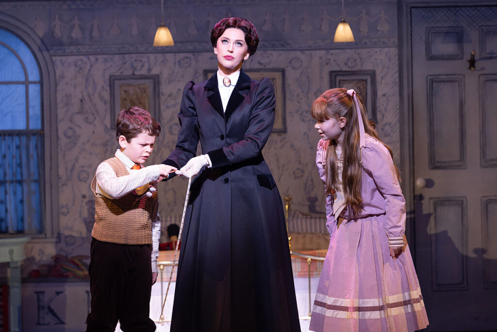 MARY POPPINS. Stefanie Jones as Mary Poppins, Charlie Donald as Michael Banks and Florence Swann as Jane Banks
