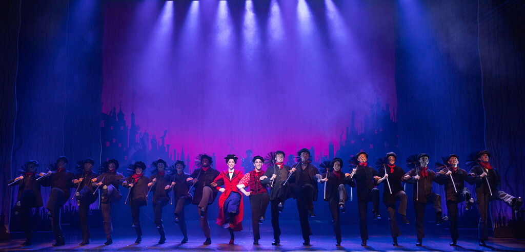 MARY POPPINS. Stefanie Jones(Mary Poppins), Jack Chambers (Bert) and Company. Photo Danny Kaan.