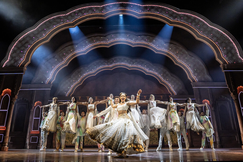 Jena Pandya and Company of Come Fall in Love the DDLJ Musical Credit: Johan Persson