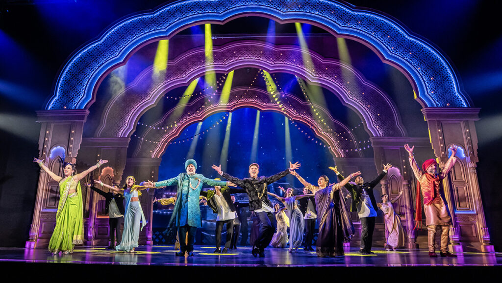 The Company of Come Fall in Love the DDLJ Musical. Credit: Johan Persson